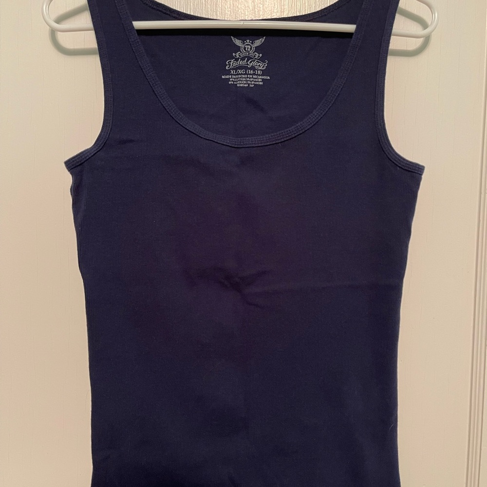 Navy blue tank top. Only worn once or twice. Like new.